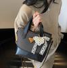 Bolso de mano de color contrastante popular de este año para mujer 2025 nuevo bolso de cubo más vendido versátil casual de alta gama bolso bandolera