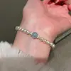 Pulsera Auténtica de Perlas Redondas con Calcedonia Azul Natural Cordón Elástico para Mujer, Estilo Suave Versátil de Nicho Otoño e Invierno