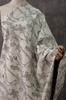 Tela Jacquard de Doble Cara con Dibujo Lineal de Flor de Abeja Blanco Cremoso Estilo Chino Sobrefalda Retro Chaqueta Chaleco Ropa Tela de Diseño