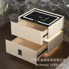 Mesa de noche flotante de lujo ligero con luz sensor, carga inalámbrica, cerradura de contraseña multifunción, mueble de almacenamiento para dormitorio principal de celebridad de internet, estilo nuevo