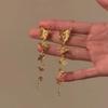 Pendientes de mariposa dorada "Amor fluido" 2024. Nuevos y explosivos pendientes de borlas de lujo, ligeros y de alta gama para mujer.