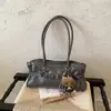 Bolso plisado retro simple para mujer, nuevo modelo 2026, bolso de hombro de gran capacidad para el trabajo, bolso de mano tote de otoño e invierno