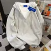 Sudadera con capucha de estilo coreano, sencilla, de dos piezas simuladas, para hombre y mujer, nueva para otoño e invierno 2026, jersey de color liso, holgada, para parejas, moderna