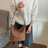 Bolso de cubo de nicho de alta gama transfronterizo para mujer, nuevo, textura tejida retro, bolso de hombro único para debajo del brazo, bolso de mano para ir al trabajo