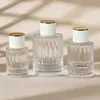 Ventas Directas de Fábrica de Botellas de Perfume de Vidrio en Stock, Botellas de Relleno de Perfume de Gama Alta, Botellas de Spray de Perfume con Nuevo Diseño Romano, Botellas Vacías