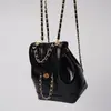 Xzbag Coreia do Sul nicho outono e inverno mini mochila de corrente tipo balde blogueira ins couro encerado bolsa de ombro para estudante