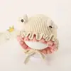 Bonitos y adorables gorros de otoño e invierno para niños, con diseño de poner, material de punto y una serie de dibujos animados, que brindan abrigo y protección para los oídos para bebés y niños pequeños.