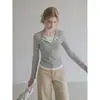 Camiseta de manga larga a rayas, cuello redondo, media apertura, estilo coreano AUDIST para mujer, principios de otoño 2026, top adelgazante y elegante