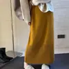 Falda de ganchillo calada de alta resistencia para mujer, nuevo estilo coreano otoño e invierno 2026, falda recta de felpa de alta gama de longitud media