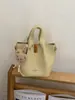 Bolsa Balde Retrô de Nicho Estilo Coreano 2026 Nova Moda Bolsa de Mão de Alto Valor Simples para Ombro e Transversal