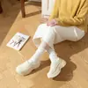 Bolsa impermeable para aumentar la altura y pantuflas de algodón para mujer, estilo nuevo de invierno para interior, con felpa adicional, cálidas, tipo "pisa-mierda", zapatillas de algodón para casa para mujer