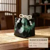 Brocado de canción nuevo diseño, bolsa de almacenamiento creativa hecha a mano anti-caída para juego de té, organizador de juego de té retro de nuevo estilo chino, bolsa de tela para taza de té