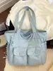 Bolso de lona de mezclilla de gran capacidad para mujer, nuevo modelo 2026, bolso de mano de viaje práctico con múltiples bolsillos, bolso de hombro para el trabajo