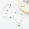 Moda Retro Nueva Chinoiserie Lujo Accesible Gama Alta Traje Collar de Concha Piedra Verde Chapado en Oro de 18K Acero de Titanio Mayoreo