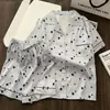 Pijama de verano fino de seda helada para mujer, estilo coreano, dulce y elegante, cárdigan de lunares, shorts de manga corta, ropa de casa moderna, se puede usar afuera