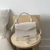 Bolso pequeño cuadrado único, simple y elegante, nuevo bolso casual de hombro y bandolera, bolso de mujer de moda y tendencia para el verano 2026