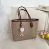 Bolso de Mano Elegante para el Trabajo Nueva Moda Primavera 2026 Versión Coreana Bolso de Hombro para Debajo del Brazo Bolso Tote Elegante de Moda