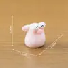 Figura de porquinho miniatura fofa com olhos grandes e redondos, perfeita para decorações DIY de casa de bonecas e como um pequeno ornamento de mesa