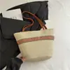 Diseño Simple Bolso de Hombro de Moda para Mujer Primavera y Verano 2025 Tejido de Alta Gama Bolsa de Cubo para Vacaciones en la Playa