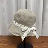 Corbata de moño de lunares de nuevo estilo, Sombrero de pescador para mujer, Estilo casual de vacaciones de primavera y verano, Sombrero para el sol con ala ancha y protección solar