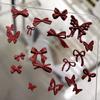 Nuevos accesorios de arte de uñas con pintura en aerosol de aleación, accesorios de arte de uñas de la suerte de Año Nuevo rojo de otoño e invierno, lazos huecos conjoined