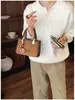 Bolsos Retro de Gama Alta de Nicho para Mujer 2026 Nuevo Bolso Cruzado Casual Otoño/Invierno Bolso de Mano Cuadrado Pequeño Súper Popular
