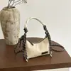 Bolsas de mano pequeñas populares de verano para mujer 2026 nueva moda casual versátil bolso de hombro bolso cruzado para ir al trabajo