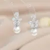 Nuevos Pendientes Franceses de Perlas Vintage Otoño e Invierno para Mujer con Pasador de Plata S925 Sentido de Alta Gama Pendientes de Zirconia Pétalo Pendientes Versátiles