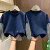 Camiseta de manga larga para niña, nuevo modelo otoño 2026, camiseta básica para niños, top súper elegante de imitación de dos piezas para niñas