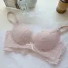 Ropa interior de encaje jacquard color crema para mujer, sin aros, para pecho pequeño, push-up, ajustable, para el área paramar, traje de sujetador de látex