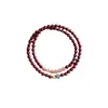 Pulsera de cinabrio al por mayor, estilo femenino de doble vuelta, apilada en dos capas, método antiguo de incrustación de esmalte, arena dorada púrpura, cristal de fresa, loto de la buena suerte, disponible para dropshipping