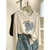 Diseño único, camiseta de algodón de manga larga con cuello redondo y estampado de copos de nieve para mujer, un estilo ligero de otoño que se puede usar como capa exterior, ofreciendo un look casual, juvenil y a la moda.