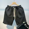 Marca de moda Ins Shorts Casuales Holgados Versátiles Moda Casual Estilo Coreano Shorts de Cinco Puntos 2026 Verano Pantalones Cortos Casuales para Hombre