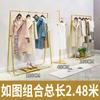 Estante de exhibición dorado para tienda de ropa, combinación de piso a techo, estante para tienda de ropa de mujer, estante de exhibición de isla de hierro, perchero