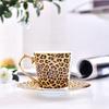 Taza y Platillo de Café con Mango Dorado de Cerámica Estampado de Leopardo Juego de Regalo Fabricante Mayorista con Logo Taza y Platillo de Porcelana de Hueso Taza