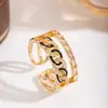 Conjunto de Duas Peças: Pulseira Aberta e Anel em Cobre Trançado de Alta Qualidade com Zircônia Conjunto Versátil para o Dia a Dia de Luxo Leve Francês Atacado