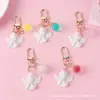 Chaveiro Pingente Ins Tendência Anjo de Asas Brancas Bola Colorida de Gelatina Acessório Personalizado para Bolsa e Capa de Fone de Ouvido