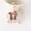 Llavero de Elefante de Nariz Larga Pintura Metálica con Incrustación de Aceite y Diamantes, Colgante para Bolso, Regalo de Atracción Turística de Tailandia, Colgante de Elefante Dorado Tailandés