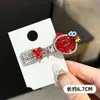 Pinza para el pelo dulce de Gato Kt sonriente lindo coreano para mujer, nuevo clip de strass rojo de nicho para flequillo lateral