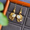 Pendientes de fénix estilo chino retro imitación jade natural Hetian pendientes estilo madre femenina estilo antiguo pendientes femeninos gancho de oreja de oro