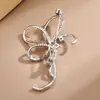 Broche de alta calidad, sentido de nicho, moda creativa, micro incrustación de circonita, ramillete, lazo de alta gama, accesorios elegantes para traje, venta al por mayor