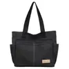 Bolsa de Lona Estética de Alto Valor para Mulheres, Grande Capacidade, Bolsa de Ombro para Estudantes, Bolsa de Mão Portátil, Novo Estilo Tendência Primavera/Verão 2026