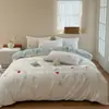 Juego de cuatro piezas de algodón puro, algodón lavado, bordado floral fresco, sábana bajera, funda de edredón, sábana encimera, ropa de cama para todas las estaciones 1.8