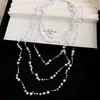 Collar de perlas en capas con cuentas transfronterizo europeo y americano, cadena para la clavícula estilo fiesta vintage, lujo ligero, accesorio versátil de alta gama para mujer