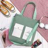 Bolso de lona, nuevo bolso de hombro de lona estampado, bolso bandolera multibolso para mujer, bolso de estilo universitario.