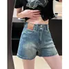 Shorts jeans de cintura alta estilo retrô americano para mulheres, novo estilo verão 2026, elástico, modelador, versátil, hot pants em linha A para garotas da moda
