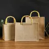Bolsa de arpillera Asa de bambú Arpillera Buda Té Bolsa individual Bolsa publicitaria Bolsa de compras Bolso de mano Bolsa de lino Al por mayor Ecológico Para llevar en la mano