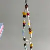 Original hecho en casa pulsera corta de cuentas de cerámica linda color de contraste cadena para colgar el teléfono móvil correa para cámara regalo para amigas
