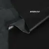 Tejido de Piel Ante Negra Elástico Piel Sintética PU Suave Caída Chaqueta de Cuero Pantalones de Cuero Tela para Ropa