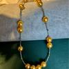 Diseña un Collar de Estilo Lujo Ligero con Perlas de Diferentes Tamaños Dispuestas en un Patrón Ordenado